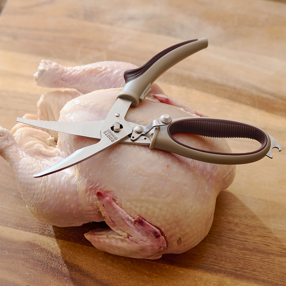 Stainless Steel Poultry Shears on a chicken